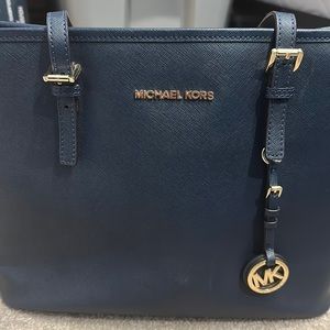 MK dark blue zip tote bag